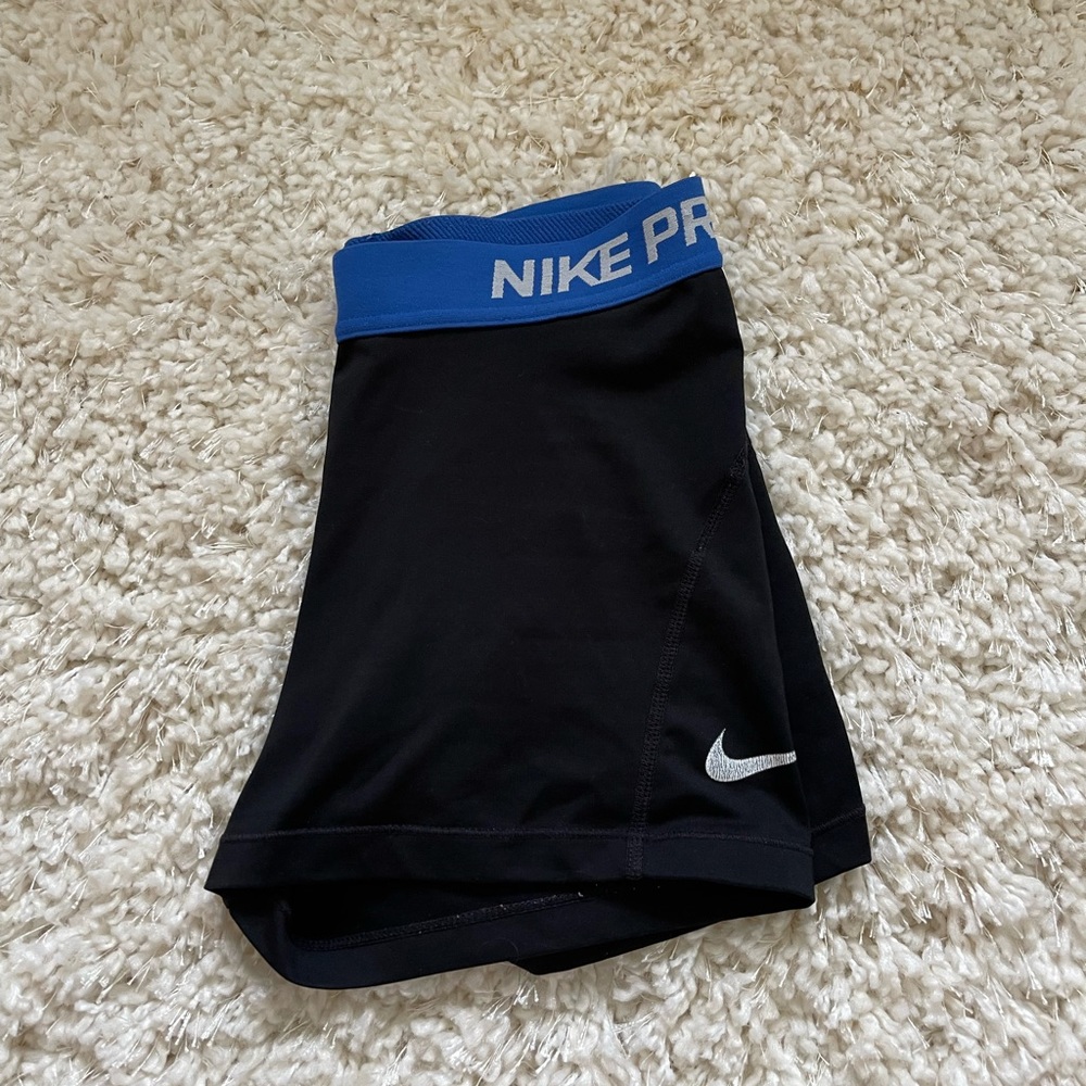 Nike Pros with royal blue band